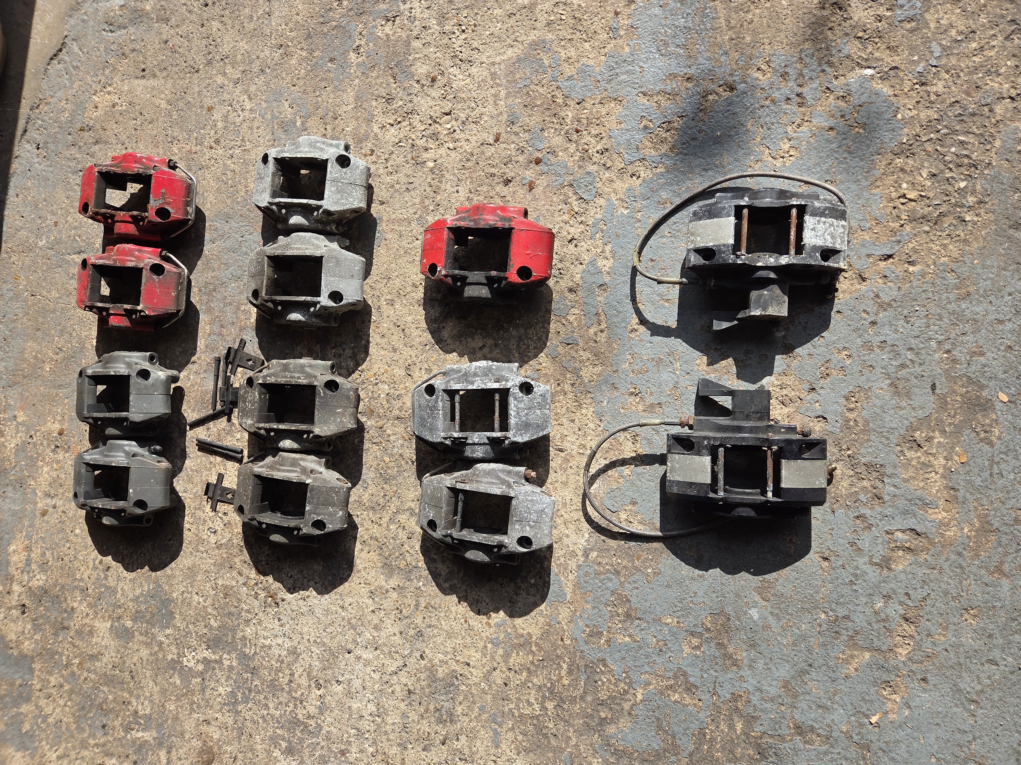 pair of 2 pot handbrake calipers, 5 pairs of AP fronts. 1 set unused. 1 odd front